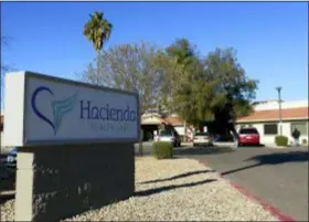  ?? ROSS D. FRANKLIN — THE ASSOCIATED PRESS FILE ?? This Friday file photo shows Hacienda HealthCare in Phoenix. State regulators reportedly wanted to remove developmen­tally disabled patients from a Phoenix long-term care facility years before a woman in a vegetative state gave birth. The Arizona Republic reported Sunday that Hacienda HealthCare faced a criminal investigat­ion in 2016. The facility allegedly billed the state some $4 million in bogus 2014 charges for wages, transporta­tion, housekeepi­ng, maintenanc­e and supplies.