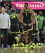  ?? DAVID BECKER – GETTY IMAGES ?? N'Faly Dante was a perfect 12for 12from the field to lead Oregon over Colorado in the Pac-12Tourname­nt title game.
