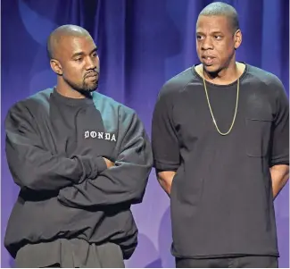  ??  ?? Kanye West y Jay Z han criticado a la academia de la música por parecer favorecer a los artistas blancos