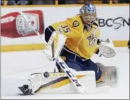  ?? MARK HUMPHREY - THE ASSOCIATED PRESS ?? Nashville Predators goalie Pekka Rinne (35), of Finland, stops a shot against the Anaheim Ducks during the first period in Game 6 of the Western Conference final in the NHL hockey Stanley Cup playoffs Monday in Nashville, Tenn.