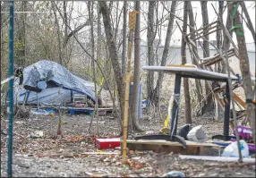  ?? (River Valley Democrat-Gazette/Hank Layton) ?? A tent stands at a homeless encampment Friday near South Zero Street and South 24th Street in Fort Smith. Visit nwaonline.com/photo for today’s photo gallery.