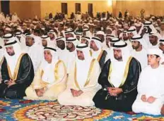  ?? WAM ?? Shaikh Hamad Bin Mohammad Al Sharqi and Shaikh Mohammad Bin Hamad Bin Mohammad Al Sharqi offer Eid prayers at the Shaikh Zayed Grand Mosque in Fujairah.