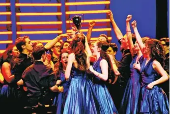  ?? CARLOS OSORIO/TORONTO STAR ?? Etobicoke School of the Arts students celebrate after winning the Show Choir Canada competitio­n on Saturday.