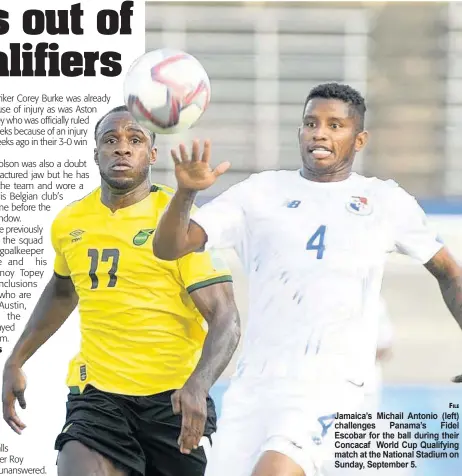  ?? FILE ?? Jamaica’s Michail Antonio (left) challenges Panama’s Fidel Escobar for the ball during their Concacaf World Cup Qualifying match at the National Stadium on Sunday, September 5.