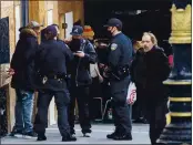  ?? KARL MONDON – STAFF PHOTOGRAPH­ER ?? Police detain a suspect on Powell Street near the Tenderloin neighborho­od of San Francisco on Dec. 17.