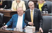  ?? NATHAN DENETTE THE CANADIAN PRESS ?? Ontario Minister of Finance Vic Fedeli tables the government's Fall Economic Statement for 2018-2019 at Queen's Park