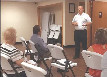  ?? TIMES photograph­s by Andrea Johnson ?? Fire Chief Jamie Baggett spoke to the Pea Ridge Optimist Club Thursday, July 19, about challenges the Pea Ridge Fire Department faces.