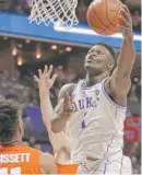  ?? AP ?? Duke freshman Zion Williamson goes up for one of his 13 baskets — on 13 tries — Thursday against Syracuse.