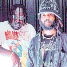  ?? STEPHANIE LYEW PHOTOS ?? FAME 95FM’s disc jockey Franco (left) shares a frame with Protoje.