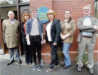 ??  ?? Fight for funding Marian Tobin (third right) and Coatbridge advice bureau staff