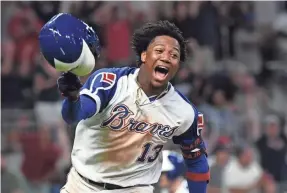  ?? ADAM HAGY/USA TODAY SPORTS ?? Ronald Acuna Jr. and the Braves lead the NL East.