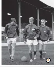  ??  ?? 2 2 With Joe Mcbride and Billy Hunter at Hibs in 1968