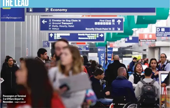  ?? | NAM Y. HUH/ AP ?? Passengers at Terminal 3 at O’Hare Airport in November.