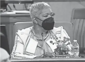  ?? KAREEM ELGAZZAR/THE ENQUIRER ?? Cincinnati City Councilwom­an Victoria Parks listens to remarks by Mayor Aftab Pureval as the new council convenes for its first full meeting Jan. 5 at City Hall in Cincinnati.