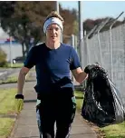  ?? KATRINA TANIRAU/STUFF ?? Plogger Zola McDonald is on a mission to rid Morrinsvil­le’s streets of rubbish.