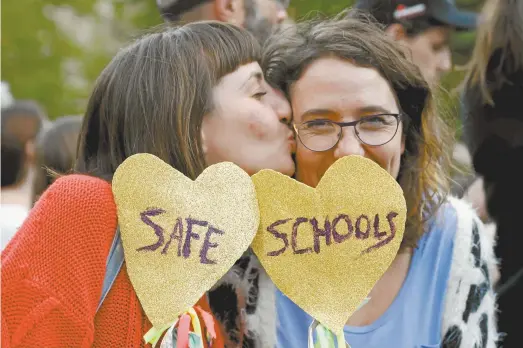  ??  ?? Supporters of Safe Schools at a rally in Melbourne last year.