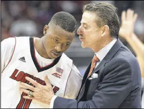  ?? TIMOTHY
D. EASLEY / AP ?? Coach Rick Pitino brings his Louisville Cardinals to McCamish Pavilion tonight to face the Yellow Jackets. Tech is trying out a new auction approach to getting the best price for remaining tickets to such high-profile games.