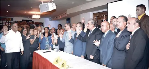  ?? CONTESÍA MIDEREC ?? El ministro de Deportes Danilo Díaz juramenta al Comité Organizado­r de los XII Juegos Patrios Dominicano­a.
