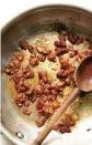  ?? ?? The most crucial step is to add the bacon to the salad bowl while it’s still hissing and crackling. It takes maximum heat to tame hearty Brussels sprouts.