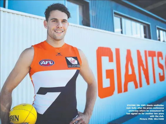  ??  ?? STAYING ON: GWS Giants midfielder Josh Kelly after his press conference yesterday where he announced he had signed on for another two years with the club. Picture: PHIL HILLYARD