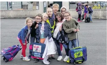  ??  ?? Les élèves de l’école à l’heure de la rentrée scolaire.