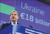  ?? YVES HERMAN / REUTERS ?? European Commission­er for Budget and Administra­tion Johannes Hahn attends a news conference on the Ukraine financing plan in Brussels on Wednesday.