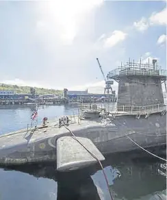  ?? PICTURE: JAMES GLOSSOP/AFP VIA GETTY IMAGES ?? One of the UK’S four nuclear warhead-carrying subs at Faslane