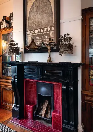  ??  ?? FROM TOP: Another stunner of a fireplace is in Kate’s study where, on the mantelpiec­e, three tribal Chinese Mao 19thcentur­y wedding crowns and a 17th- century baroque cross from Bern are flanked by cabinets to keep her precious books safe; Kate picked up these paintings in Buffalo, New York and then snaffled them in the set sale (when props are sold off) after the film Crimson Peak wrapped. “Nothing like having a bunch of old ladies keeping you company.”