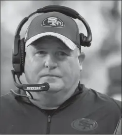  ?? The Associated Press ?? BACK TO SCHOOL: Chip Kelly, shown here coaching the San Francisco 49ers on Jan. 1, agreed to a five-yard, $23.3 million deal to become UCLA’s football coach on Saturday. Kelly had a record of 46-7 in four seasons at Oregon before jumping to the NFL in...