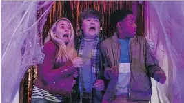  ?? COLUMBIA PICTURES ?? Madison Iseman, left, Jeremy Ray Taylor and Caleel Harris must conquer an evil plan to bring Halloween decoration­s to life.