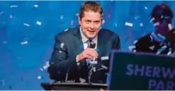  ?? ?? TORONTO: Andrew Scheer, newly elected leader of the Conservati­ve Party of Canada, is showered in confetti during his acceptance speech at the party’s convention on Saturday. —AFP