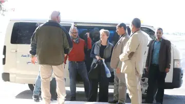  ??  ?? Members of a United Nations advance team tasked with monitoring a ceasefire between the Iranian-aligned Houthi group and Saudibacke­d government forces in Yemen’s Hodeidah, arrive at Sanaa airport, Yemen. — Reuters photo