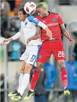  ?? Picture: RICHARD HUGGARD/GALLO IMAGES ?? READY FOR A FIGHT: Daine Klate, left, of Chippa and Mthokozisi Dube of Pirates are airborne in a tussle for the ball during their league clash at Nelson Mandela Bay Stadium in PE.