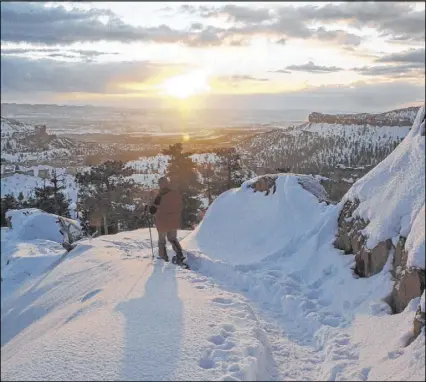  ?? Deborah Wall Las Vegas Review-Journal ?? Winter hiking and snowshoein­g are allowed below the rim on some of Bryce Canyon’s trails.