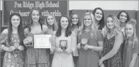  ?? TIMES photograph­s by Annette Beard ?? Varsity cheerleade­rs were recognized by coach Noelle Littrell-Webb.