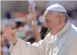  ?? FILIPPO MONTEFORTE, AFP/GETTY IMAGES ?? Pope Francis greets the crowd Wednesday at the Vatican.