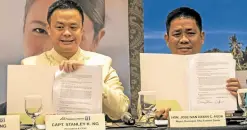  ?? ?? Philippine Airlines president and chief operating officer Captain Stanley Ng (left) and Borongan City Mayor Jose Ivan Dayan Agda present the signed memorandum of agreement.