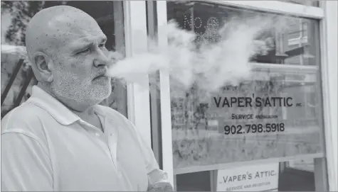  ?? COLIN CHISHOLM ?? Kevin Murphy, owner of Vaper’s Attic in downtown Windsor, said Windsor town council should consider creating ‘safe-zones’ for smokers to go if they’re going to make it almost impossible to smoke anywhere else.