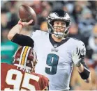  ?? GEOFF BURKE/USA TODAY SPORTS ?? Eagles quarterbac­k Nick Foles passed for two TDs in the 24-0 victory Sunday against the Redskins.