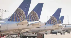  ?? | SCOTT OLSON/ GETTY IMAGES FILE ?? United Airlines’ quarterly results indicate that a two- year decline in average airfares is over.