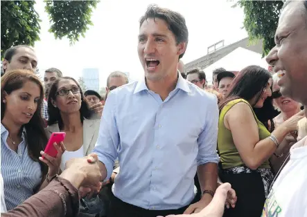  ?? CHRISTINA RYAN/ CALGARY HERALD ?? Justin Trudeau launches the Liberals’ federal election campaign in the Calgary- Confederat­ion riding on Monday.