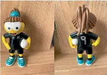  ?? ?? Black Ferns rugby figurine ’Little Kenj’ was passed from Kendra Cocksedge to Ariana Bayler to carry to future test matches.