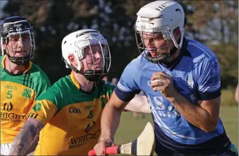  ??  ?? Shane Mythen of St. Anne’s taking on Brendan Hughes (St. Fintan’s) in the ACHL Division 7 decider.