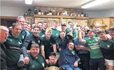  ??  ?? The Cargin Senior Football Championsh­ip winners visit Stephen McCoy after the game