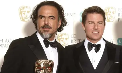  ?? ?? Alejandro González Iñárritu with Tom Cruise at the Baftas in 2016. Photograph: Dave J Hogan/Getty Images