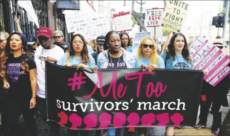  ?? DAMIAN DOVARGANES/AP ?? IN THIS NOV. 1, 2017, FILE PHOTO, Tarana Burke, founder and leader of the #Metoo movement, marches with others at the #Metoo March in the Hollywood section of Los Angeles.