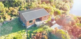  ?? Photo / NZME ?? The 16-bunk Lake Dive Hut, on the slopes of Taranaki Maunga, burnt down in 2020 in a suspicious fire.