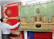  ?? — DC ?? A month-long internatio­nal exhibition of exclusive prayer rugs was inaugurate­d on Sunday at Mohammed Cap Mart in Pathergatt­i for the holy month of Ramzan. A range of rugs from Saudi Arabia, Turkey, Iran, Iraq, Belgium, Malaysia and India are on display.