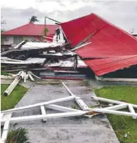  ??  ?? This handout photo taken and received from Jamie Motu'apuaka on Facebook on Feb 13 shows a damaged building at the Parliament House in Tonga's capital of Nuku'alofa after hit the country.
