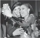  ??  ?? Beyoncé and Jennifer Hudson take time out for a selfie. GETTY IMAGES